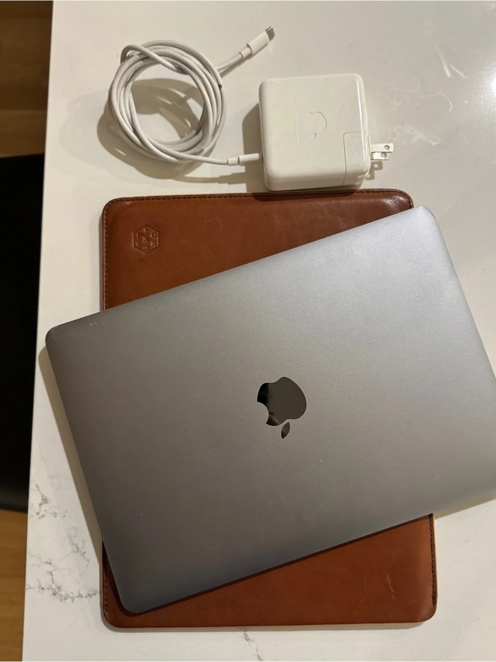 Used 2015 Apple MacBook in Space Gray with Charger and Sleeve case
